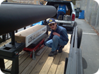 Andrew lowering the hydraulic lift.