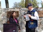 Melissa Melendez, California State Assembly Member, presents a Certificate of Recognition to Frank Campbell, Commander of the Bonefish Base